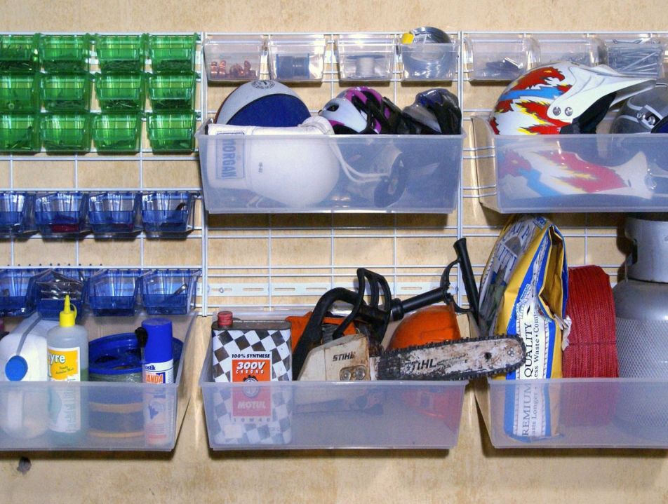 Green and blue Hobiboxes and Popboxes holding sports equipment
